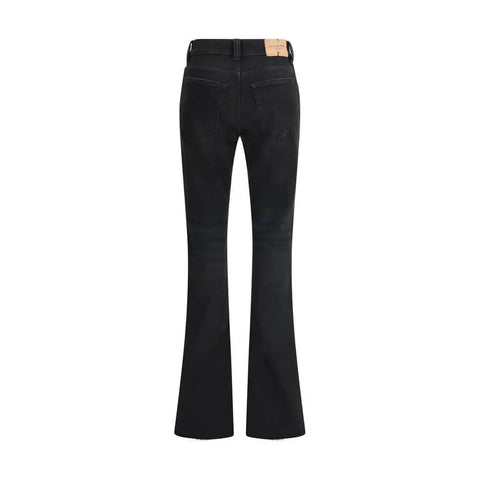 Back view of Slim bootcut Jeans featuring a raw-cut hem and five-pocket design by Balenciaga.